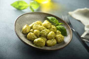 Homemade gnocchi with pesto sauce