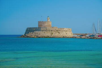 Fototapeta na wymiar Agios Nikolaos fortress on the Mandraki harbour of Rhodes Greece