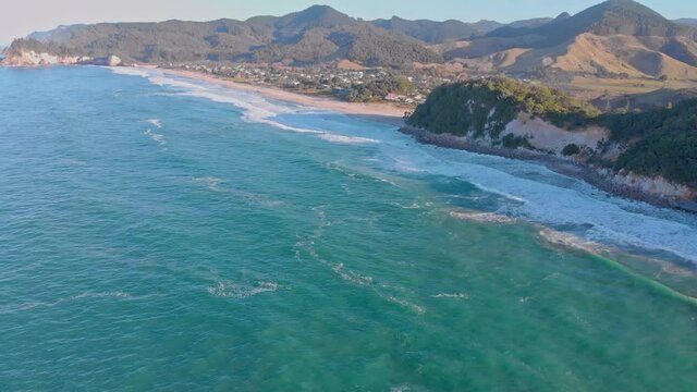 Aerial footage of Whiritoa beach and surrounding coastline, New Zealand