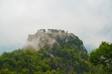 Picturesqueview on Monolithos castle overlooking the Mediterranean