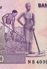 Male fieldworker. Allegorical female sculpture 
