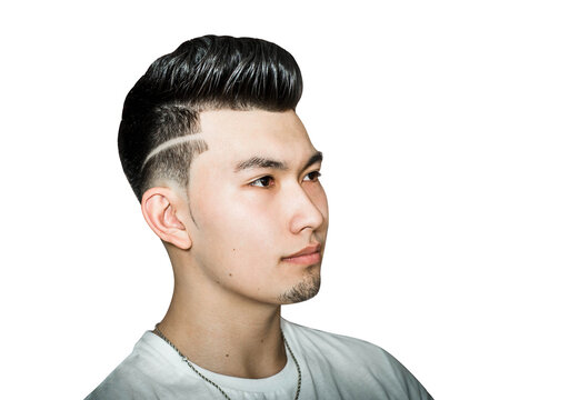 Young man brunette with pompadour volume haircut 50s - 60s. real photo retro hair style for barbershop, isolated