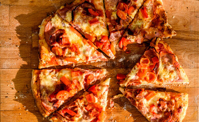 Obraz na płótnie Canvas Making of homemade Italian pizza in fireplace brick oven.