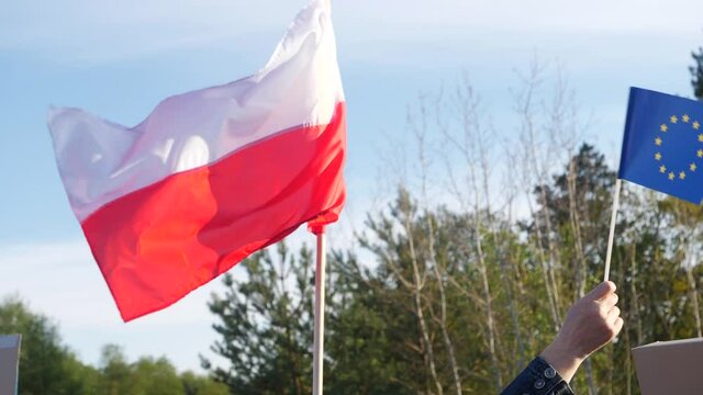 Polish flag with eu waving with swiftness closeup