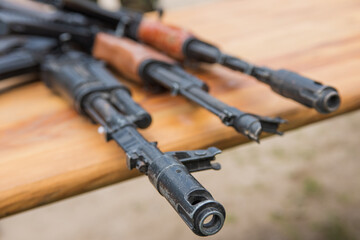 assault rifle AK-47 on a wooden surface