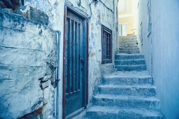 Old house and staircase from white stone on the Greek island of Symi, Dodecanese, Greece