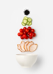Creative composition with salad ingredients and ceramic bowl