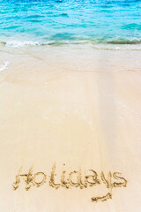 Holidays drawn on the sand in Bavaro beach, Punta Cana, Dominican Republic