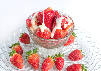 Arrangement with beautiArrangement with beautiful strawberries and condensed milk and accessories
