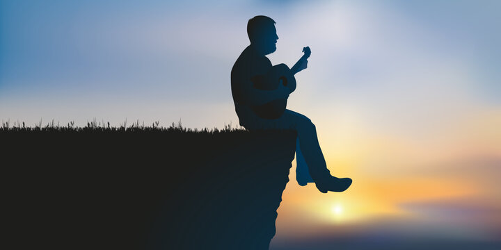 Concept de l’inspiration et de la méditation avec un musicien seul, qui joue de la guitare assis au bord d’une falaise.