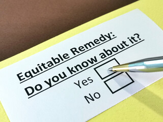 Obraz premium One person is answering question about equitable remedy.