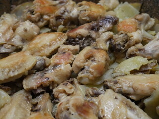 dish of chicken wings and wild mushrooms