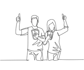 One line drawing of young happy couple giving thumbs up gesture and holding pop corn ready to watch the movie on theater. Entertainment concept. Continuous line graphic draw design vector illustration