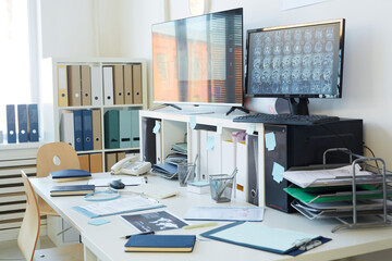 Background image of modern computer equipment at empty workplace in clinic, copy space