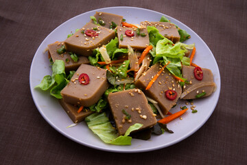 Seasoned Acorn Jelly Salad which is called Muk made of buckwheat