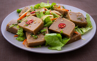 Seasoned Acorn Jelly Salad which is called Muk made of buckwheat