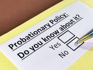 Obraz premium One person is answering question about probationary policy.