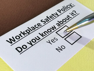 Obraz premium One person is answering question workplace safety policy.