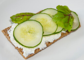 Sandwich with cheese and cucumber