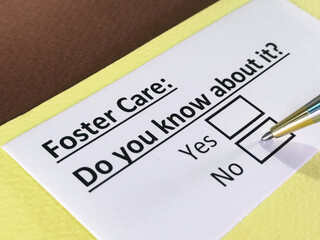 Obraz premium One person is answering question about foster care.
