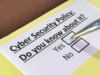Obraz premium One person is answering question about cyber security policy.