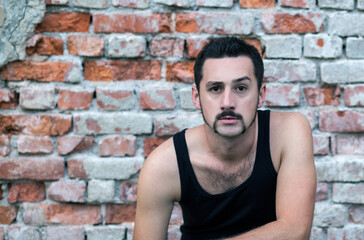 Obraz premium young white man, a hipster with a mustache