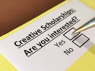 Obraz premium One person is answering question about creative scholarships.