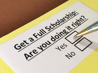 Obraz premium One person is answering question about full scholarship.