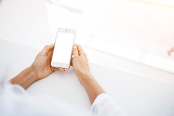  Female is reading on cell telephone financial news
