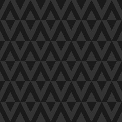 Black background. Seamless ornament of rhombs.