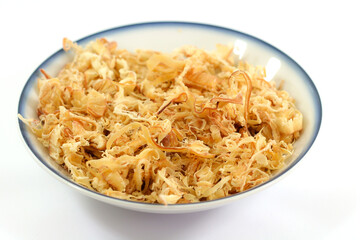 Dried shredded squid in a plate