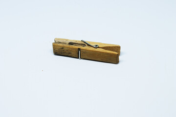wooden clothes pin on a white background