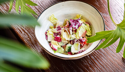 fresh summer salad with radish and cucumbers