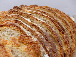 Macro image of sliced ​​bread. Pa de pagès, traditional rustic bread from Catalonia, round in...