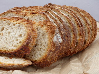 Macro image of sliced ​​bread. Pa de pagès, traditional rustic bread from Catalonia, round in shape, crispy crust and soft crumb.