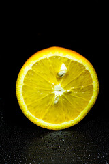 a beautiful close up view of an orange slice with beautiful background, vitamin C, covid 19