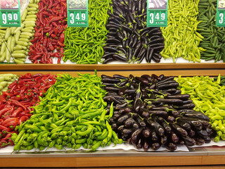 Greengrocer. Fresh vegetables and fruits. Pineapple, strawberries, potatoes, eggplant, lemon, watermelon.