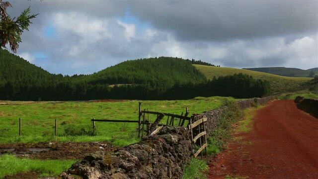 Fields with blue sky and clouds near gruta do Natal in municipality of Praia da Vitoria, on the island of Terceira
