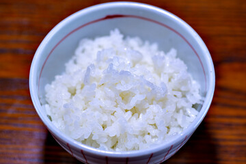 Steamed Japonica type white rice in a bowl at meal in Japan