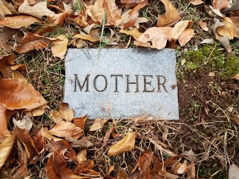 mother on granite or marble grave stone in cemetery