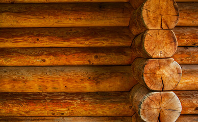 Close up of side-corner of log farmhouse.