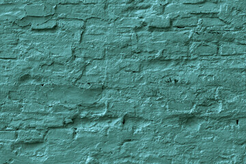 Green plastered brick wall texture.