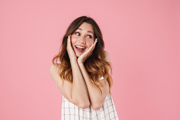 Image of happy beautiful woman smiling and looking aside