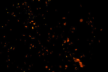 flame of fire with sparks on a black background