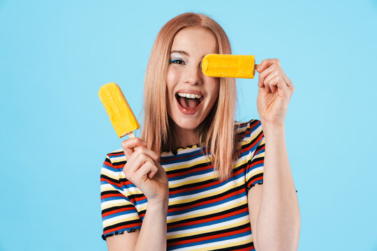 Image of cheerful pretty girl making fun with ice-cream