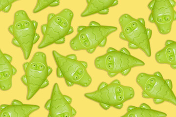 beach toy for summer. Green crocodile on yellow background