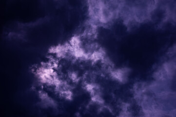 Natural sky composition. Dark ominous blue storm rain clouds. Dramatic sky. Overcast stormy...
