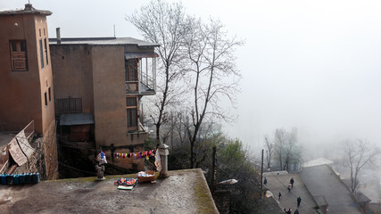 Fototapeta na wymiar Foggy morning in mountain village Masouleh, Gilan Povince, Iran, unesco world heritage