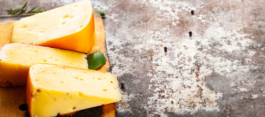 top view on cheese lying on rustic background