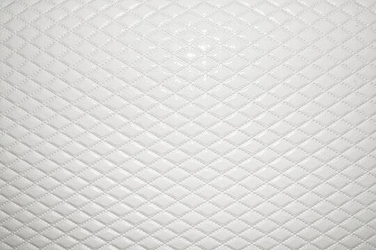 
white leather quilted texture background